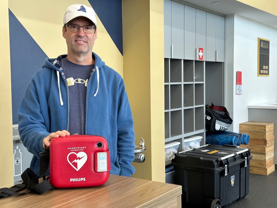Coach with an AED