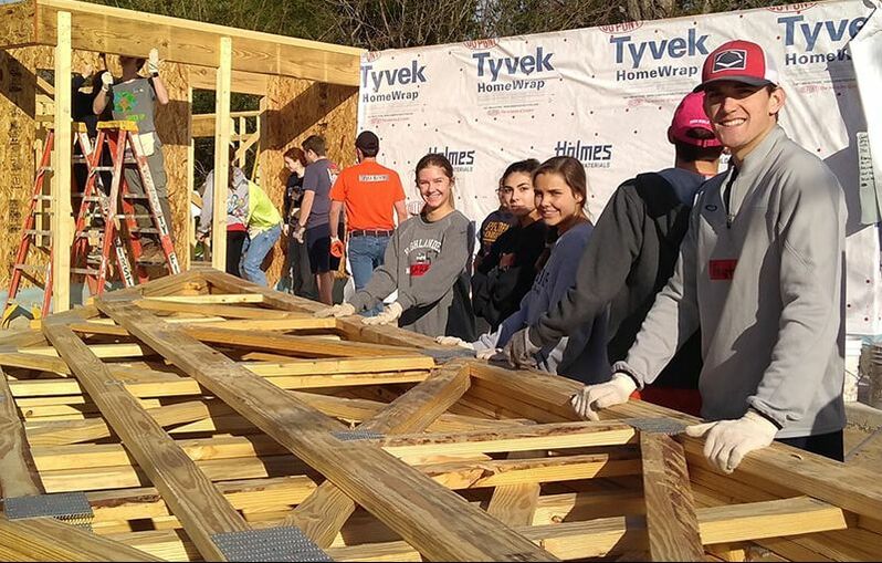 Students volunteer with Habitat for Humanity