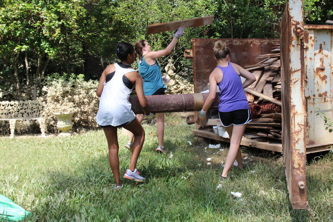 Students help after flood.