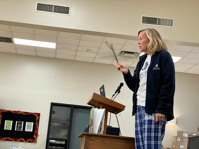 Dr. Elizabeth Lewis speaks to students.