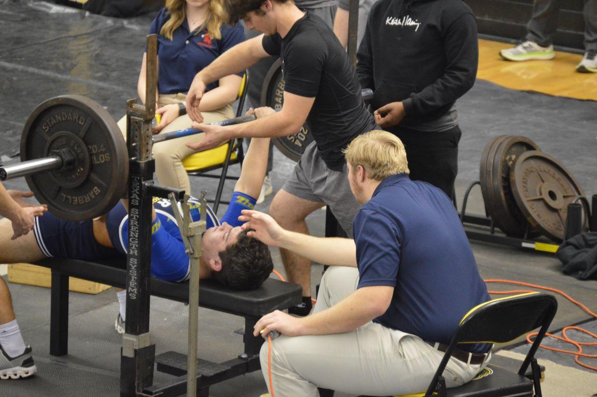 Episcopal powerlifter