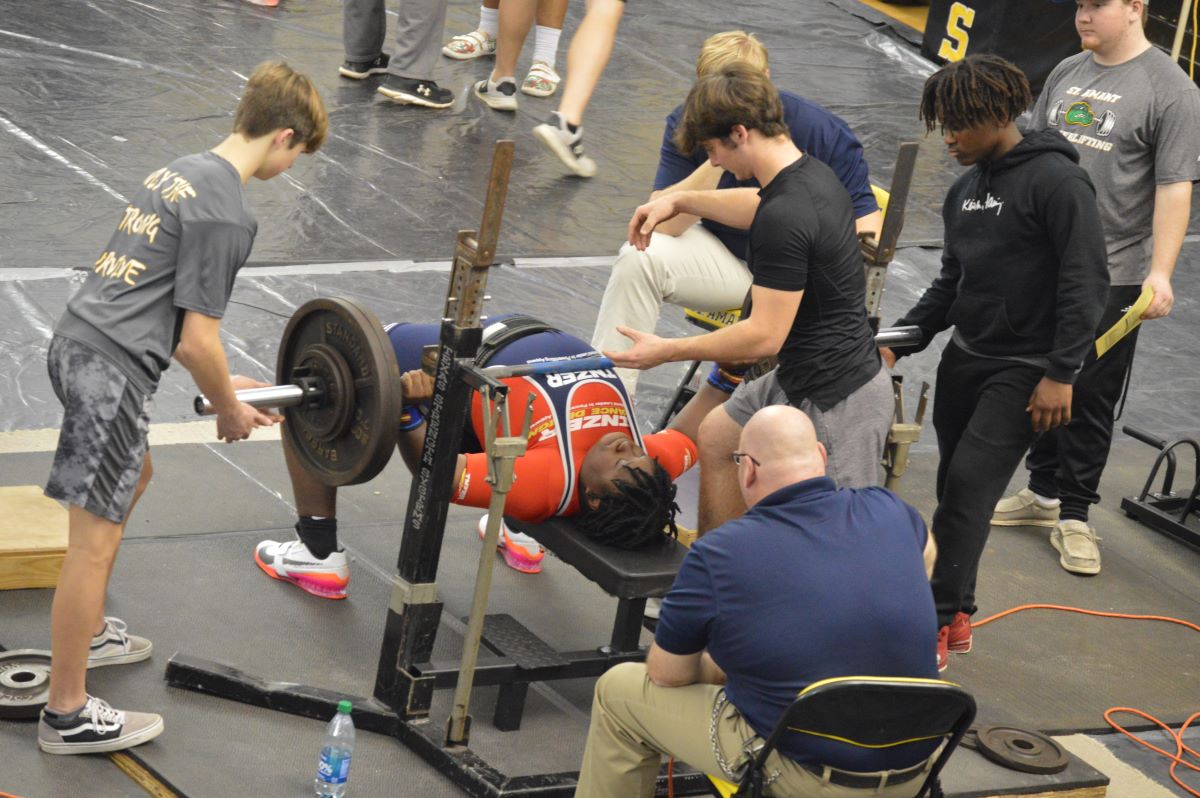 Episcopal powerlifter