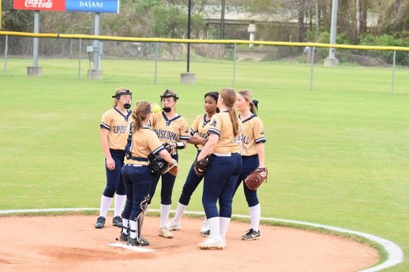 Softball team on the mound