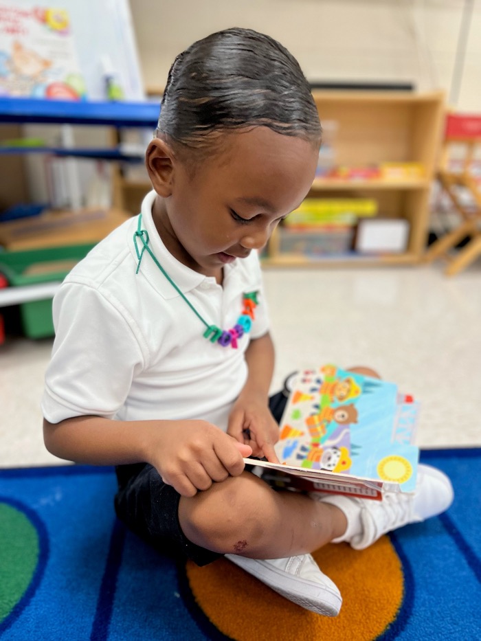 Lower School student reading