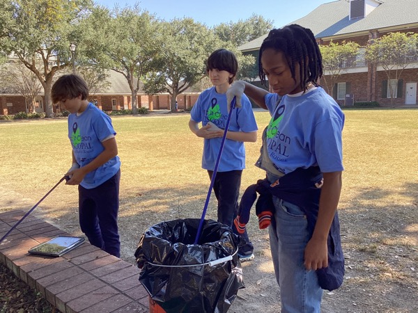 Students cleaning campus