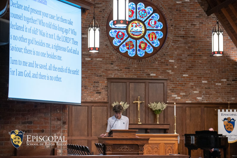 Middle School student reading in Chapel