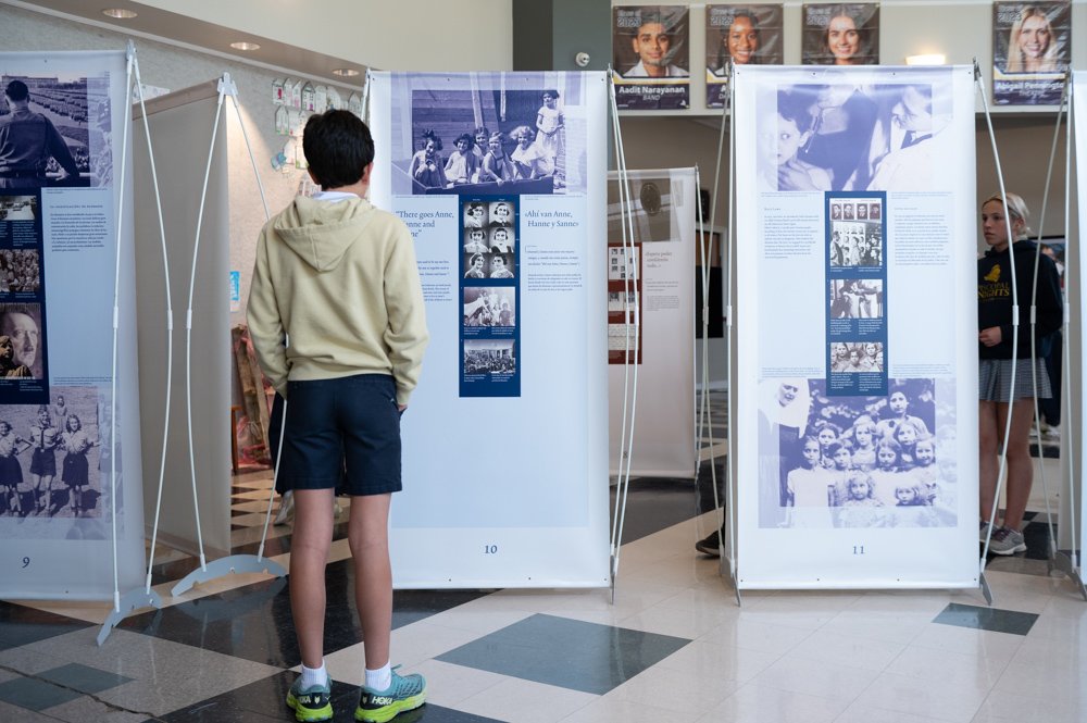 Student viewing Anne Frank exhibit