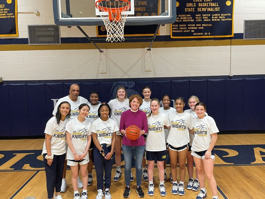 Bishop with basketball team