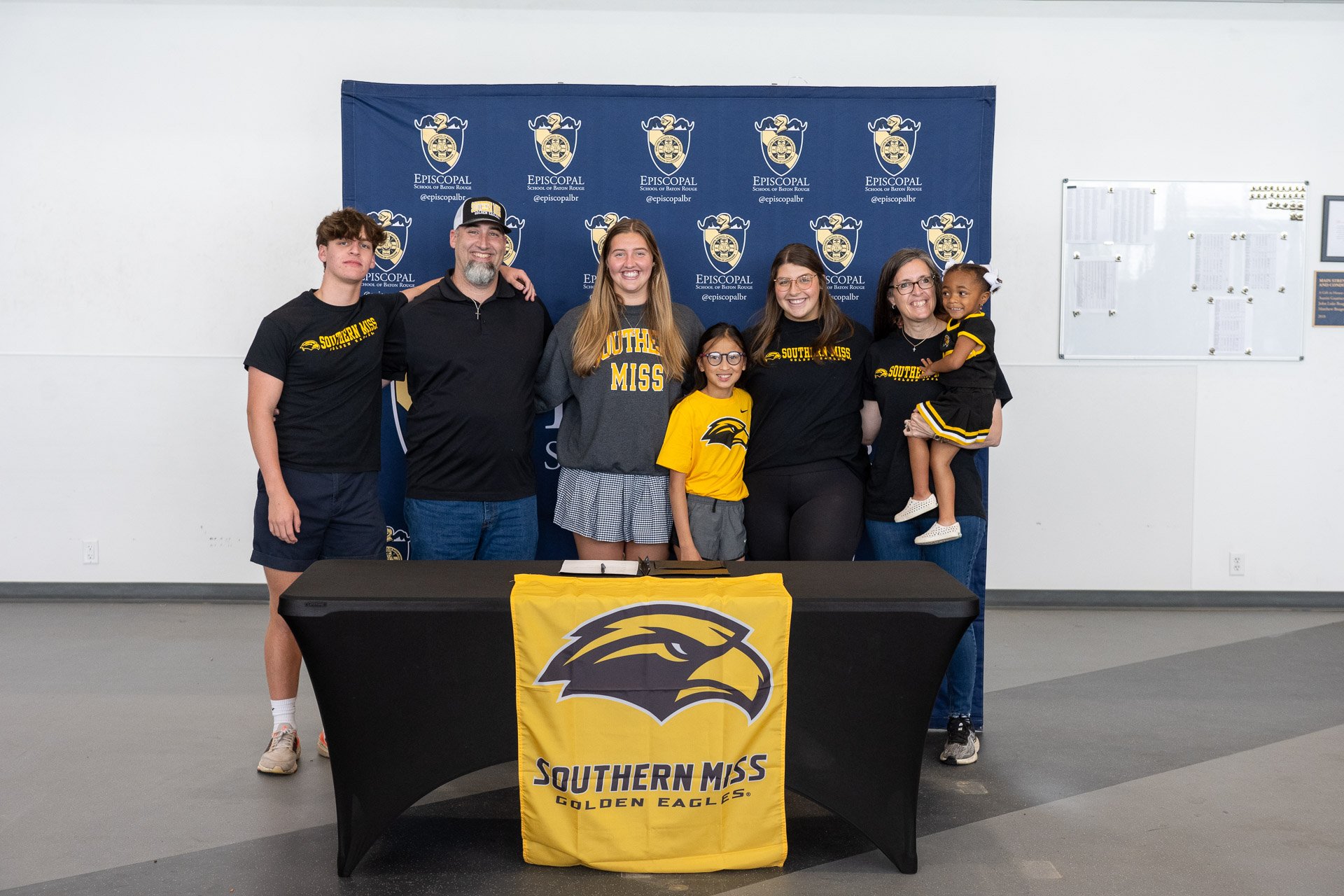Botos at signing day with parents and siblings