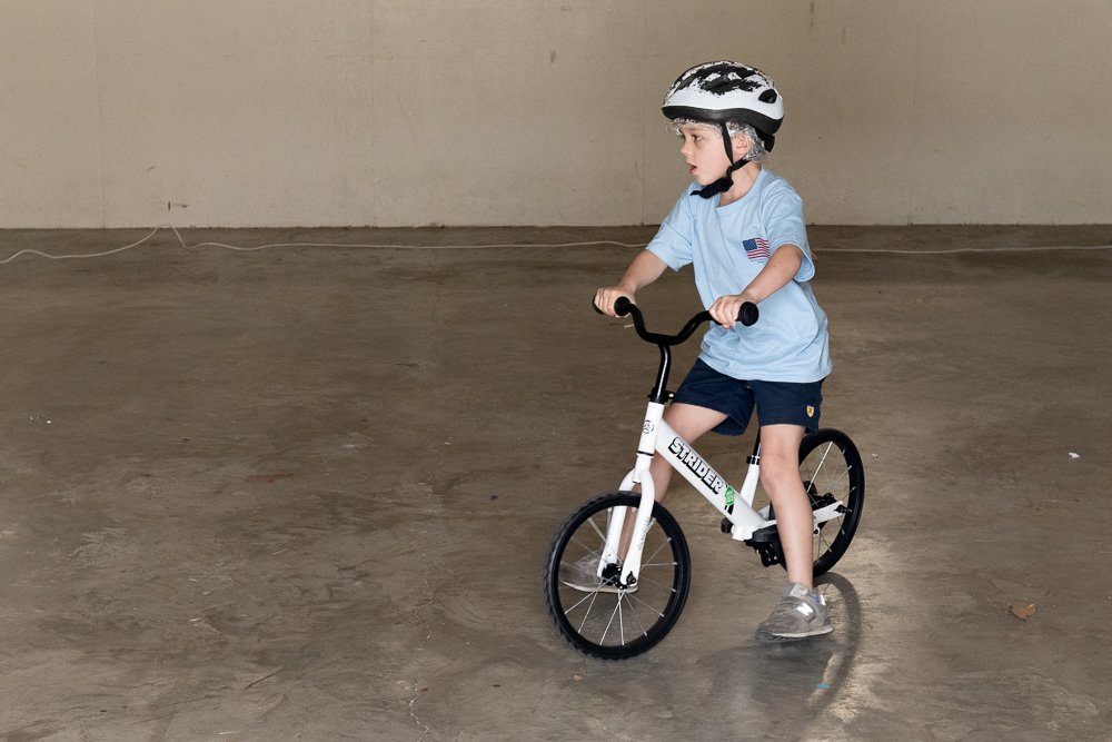 Kindergarten student on bicycle