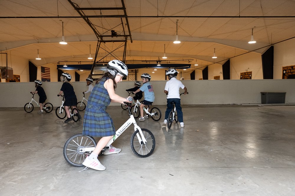 Kindergarten students on bicycles