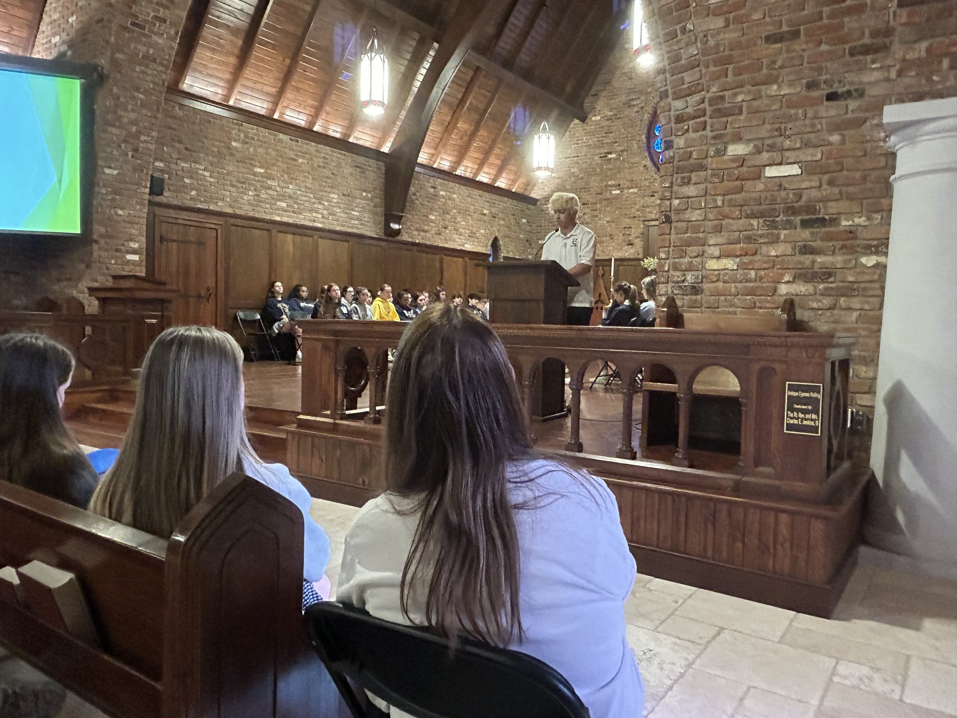 Student reading in chapel