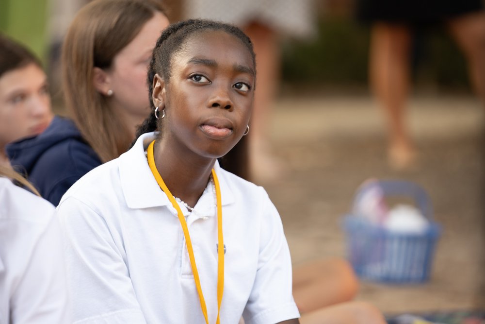 Student listening at Peace Day celebration