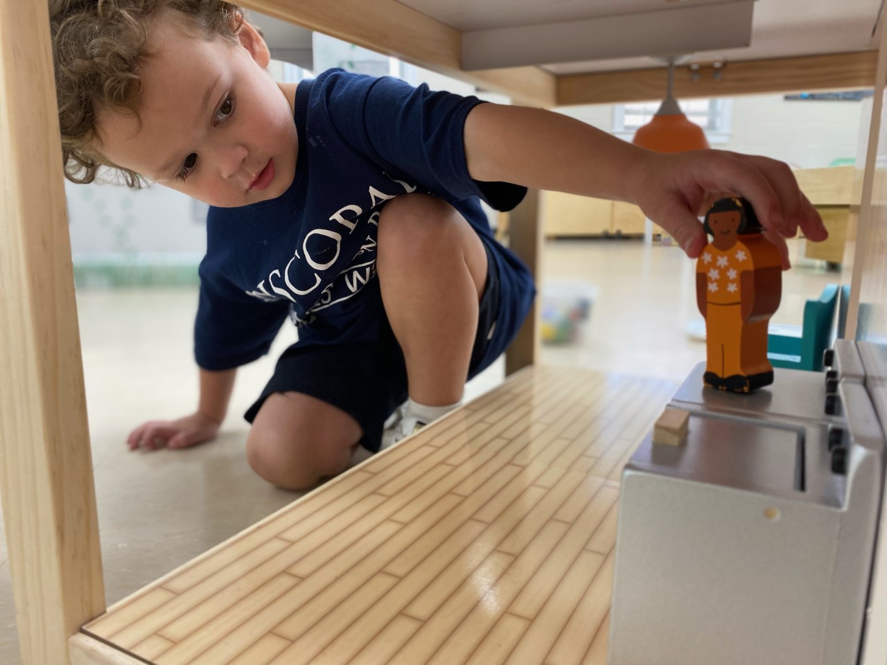 PreK student playing