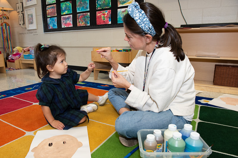 PreK-3 student and teacher