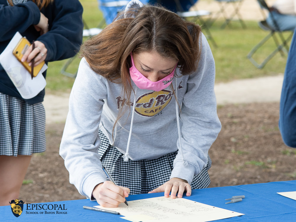 Student signs Honor Code.