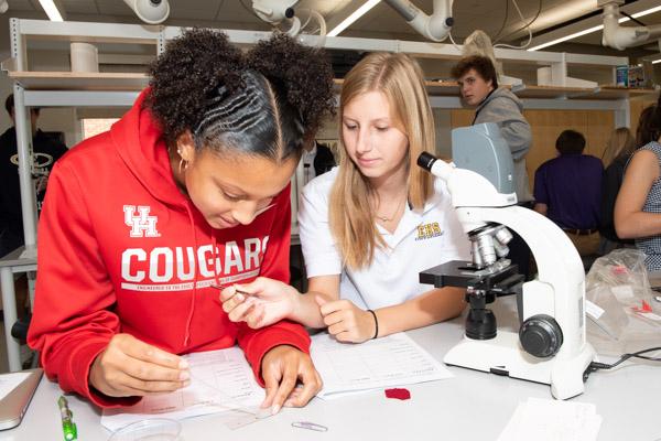 High School Students working on a Science Project